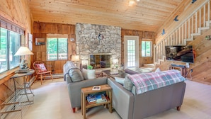 A cozy cabin interior with a stone fireplace, wooden walls, and a comfortable seating area. - Mars Hill Cabin w/ Pool Table ~ 2 Mi to Wolf Ridge (Mars Hill)
