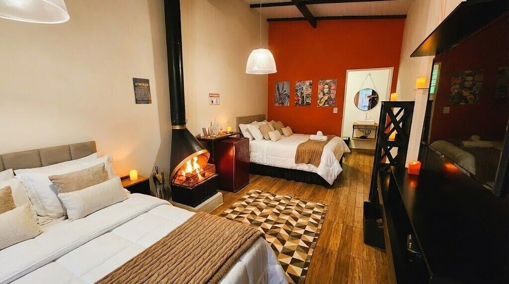 Suite exclusiva | Edredones de plumas, escritorio, wifi gratis y ropa de cama