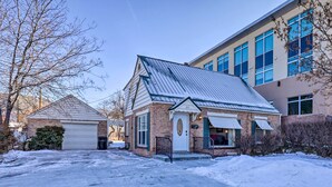 A two-story house with a garage, a covered porch, and a brick exterior. - Downtown Cedar City House < 1/2 Mi to SUU Campus! (Cedar City)