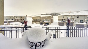 A snow-covered balcony with a chair and a railing. - Spacious Townhome ~ 7 Mi to Deer Valley Resort! (Heber City)