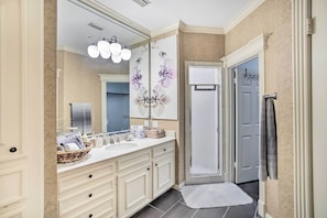 A bathroom with a large mirror, two sinks, a shower, and a towel rack. - Han Solo's Hideout Luxe Houston Home w/ Pool! (Houston)