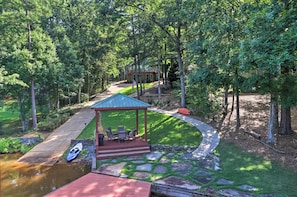 A gazebo with outdoor seating, a stone pathway, and a small body of water. - Lakefront Jacksons' Gap Home w/ Deck, Dock & Views (Jacksons' Gap)