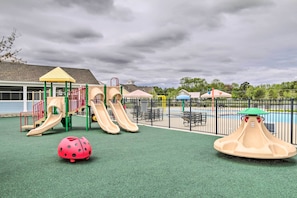 A playground with slides and a ladybug toy. - Coastal Millville Studio ~ 6 Mi to Bethany Beach (Frankford)