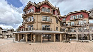 A multi-story hotel with a prominent entrance and a covered area named 'Edward Jones'. - Central Mccall Getaway: Walk to Payette Lake! (McCall)