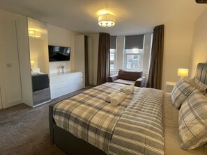 1 bedroom, desk, iron/ironing board, travel cot