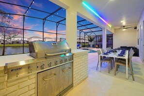 Outdoor dining - Spacious Bowling 14BR 14.5BA, Sleeps38, Lake Views (Kissimmee)