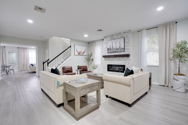 Smart TV, fireplace, books