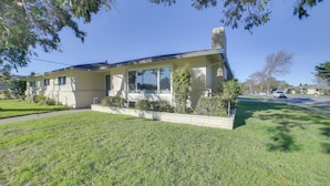 A single-story house with a front porch, a garage, and a well-maintained lawn. - Quiet Salinas Vacation Rental 10 Mi to Beach (Salinas)