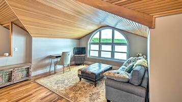 TV, fireplace, books