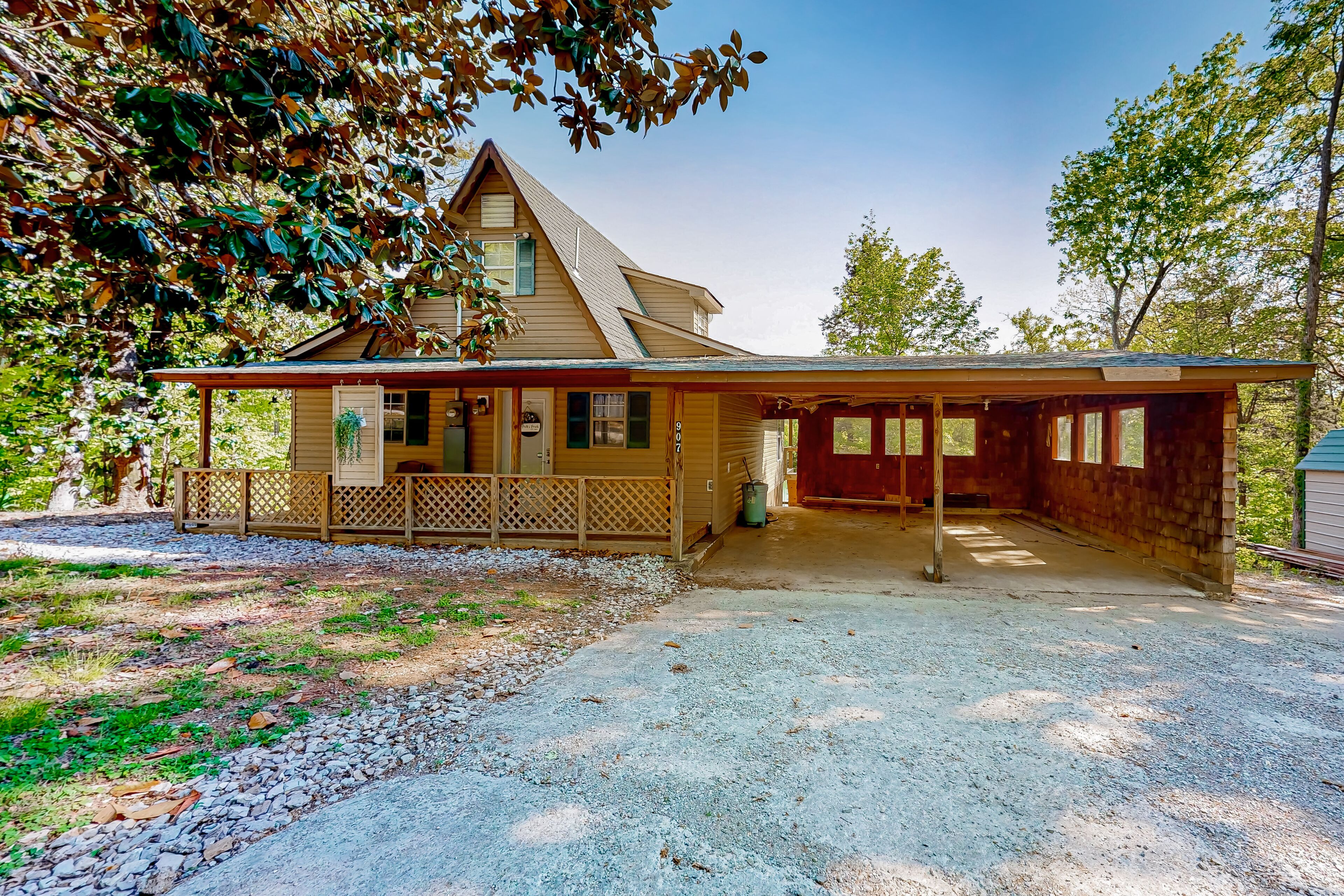 Dog-friendly waterfront home with a firepit, grill, deck, board games, & dock