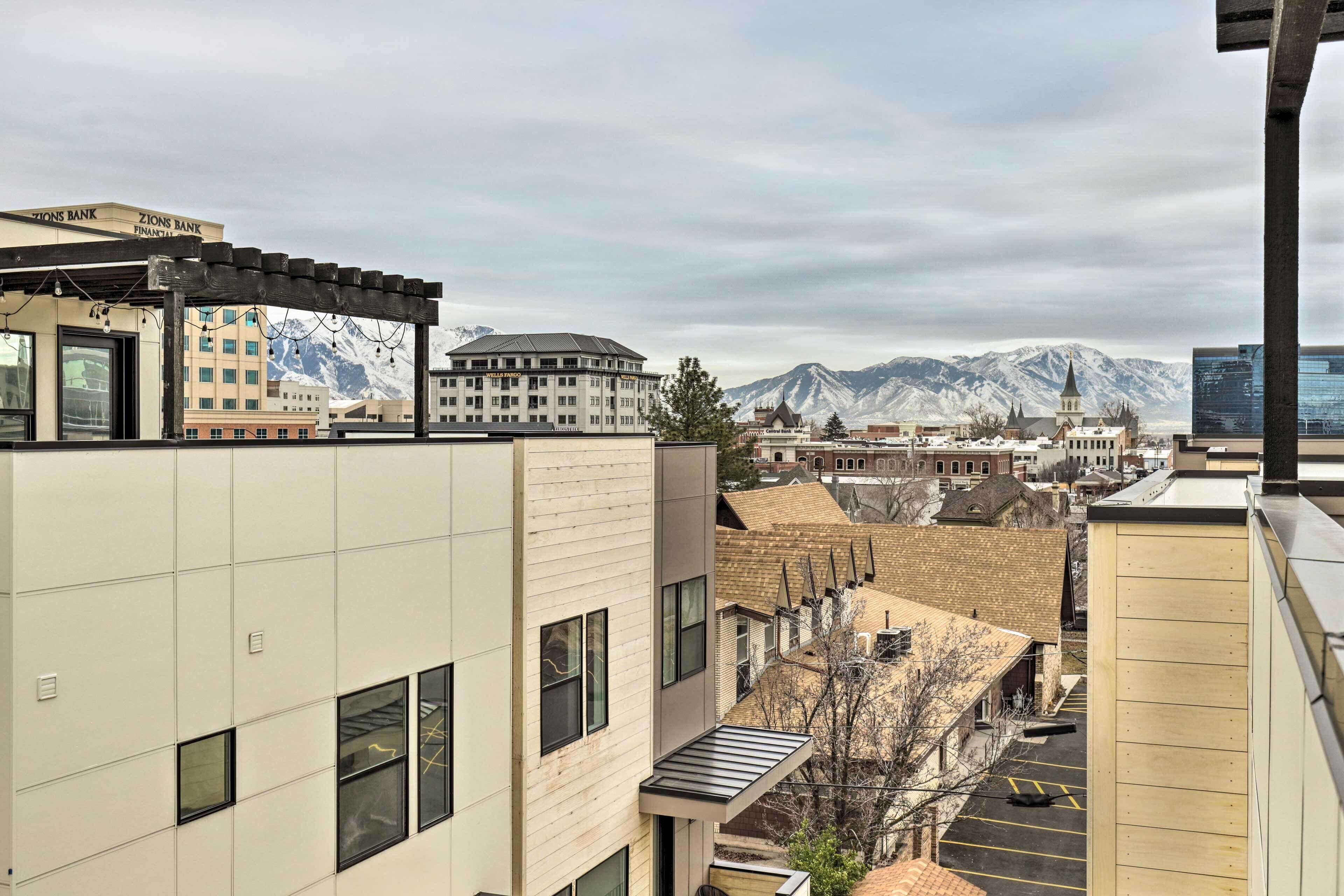 A modern building with a flat roof and a large window.