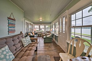 House (6 Bedrooms) | Living area | TV, books - Boat & Ski: Home on Edinboro Lake w/ Grill! (Edinboro)