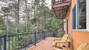 A wooden deck with a black railing, surrounded by trees. - Adirondack Oasis, 15 Mi to Lake George Village! (Chestertown)