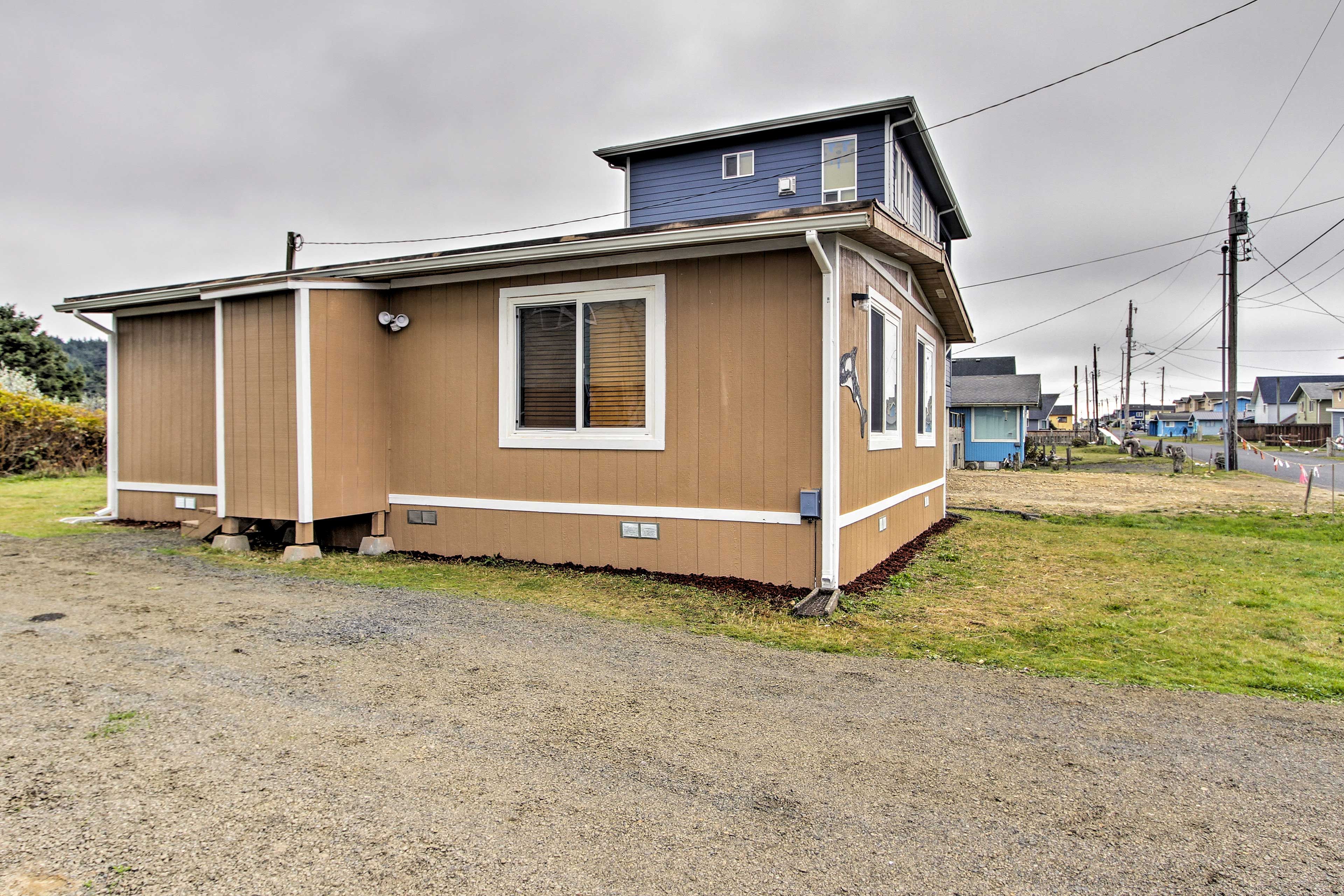 A single-story house with a small porch and a garage.