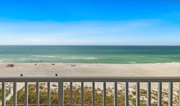 On the beach, sun loungers, beach towels