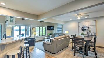 TV, fireplace, books