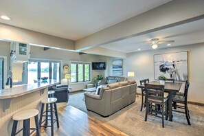 TV, fireplace, books