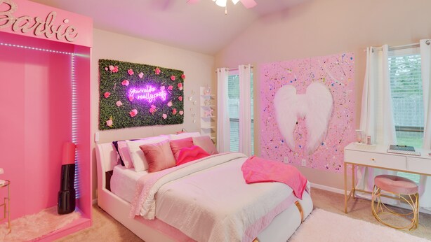 A pink-themed bedroom with a bed, a vanity, and a ceiling fan. - Temple Retreat: Game Room & Deck, Pets Welcome (Temple)