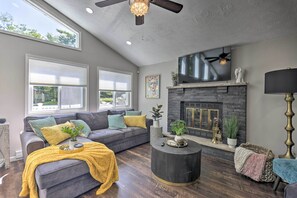 House (3 Bedrooms) | Living area | Fireplace, books