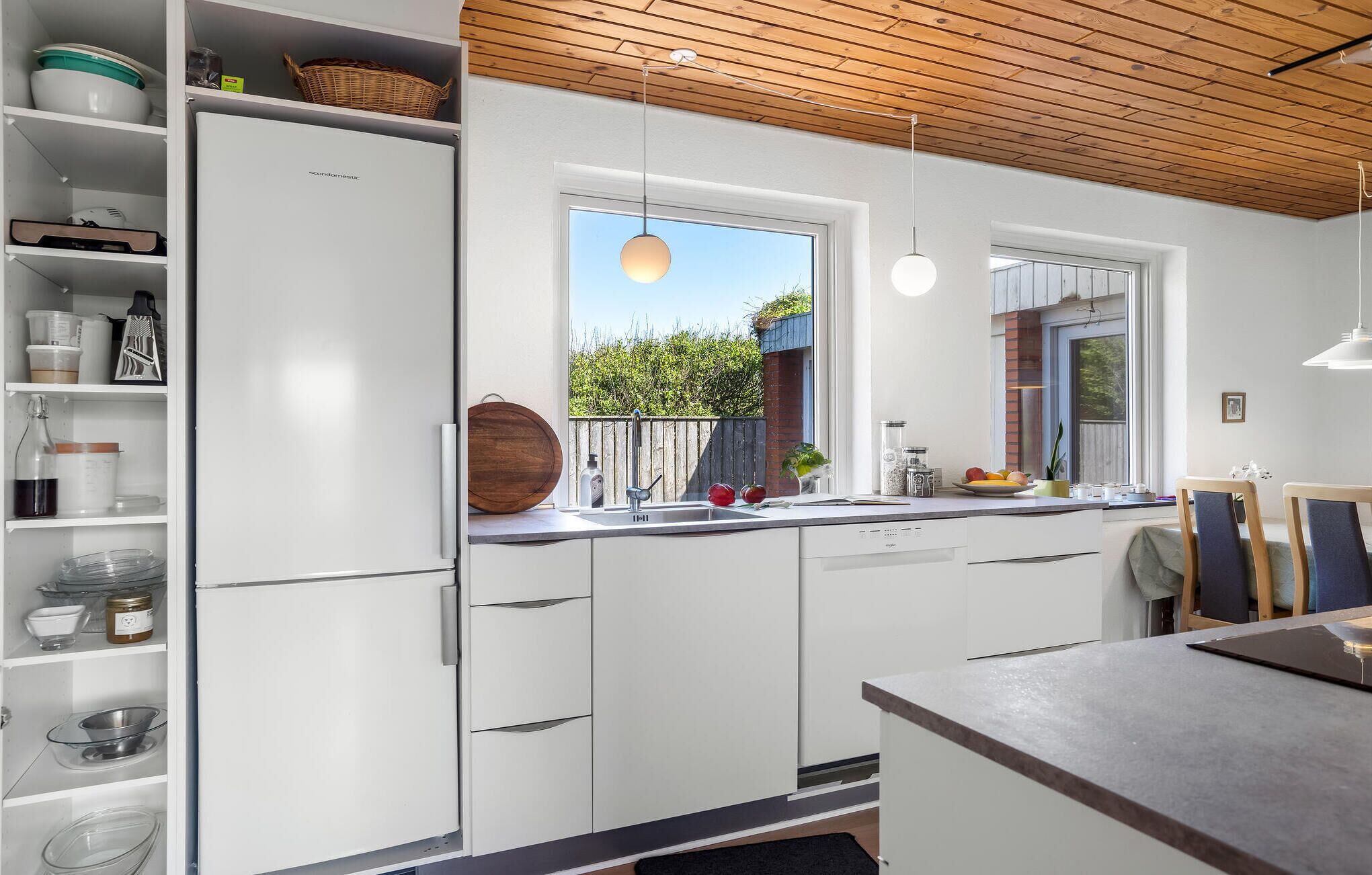 Fridge, stovetop, dishwasher, coffee/tea maker