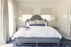 Tabla de planchar con plancha, wifi gratis y ropa de cama 