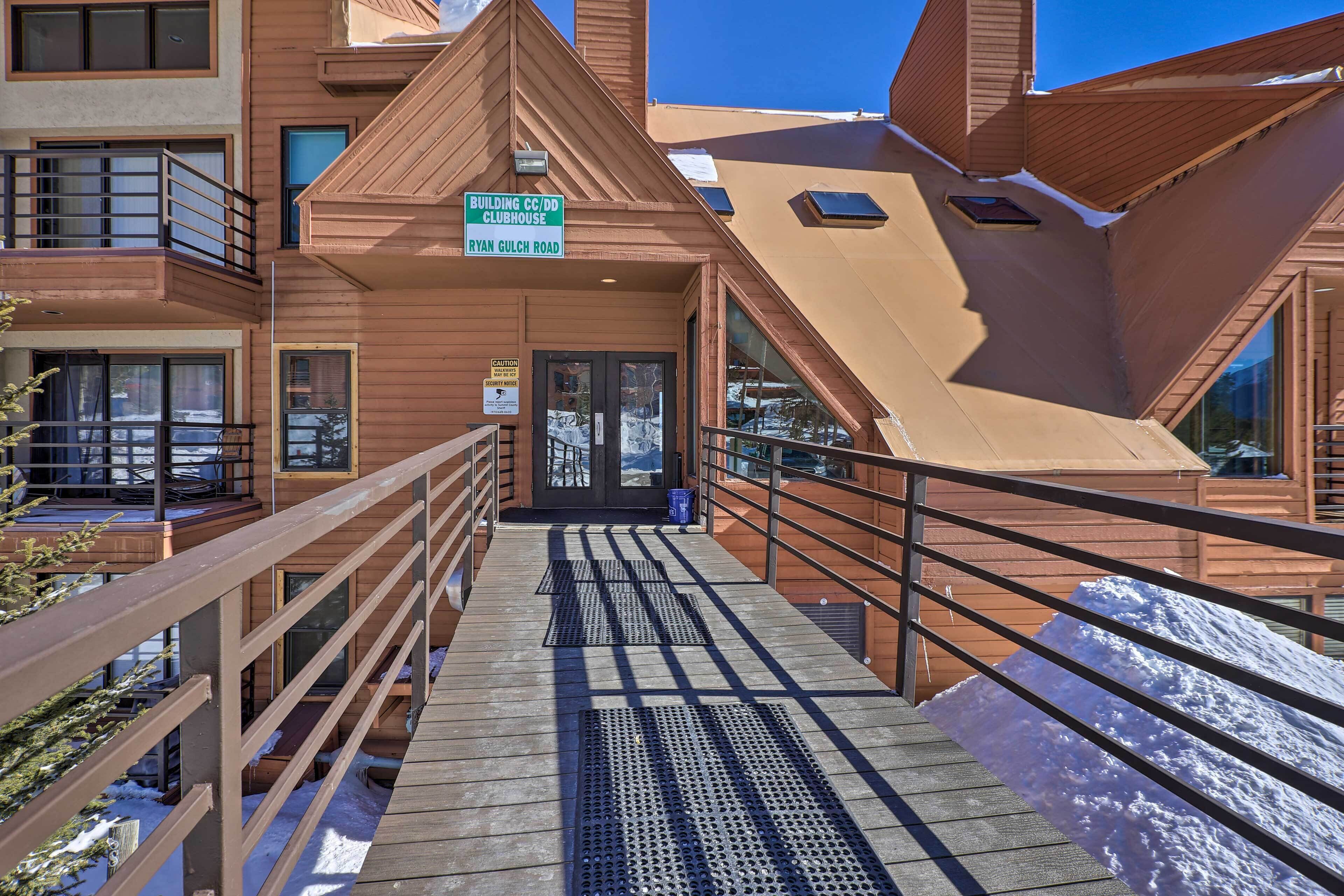 A wooden building with a sign indicating a clubhouse on Ryan Gulch Road.