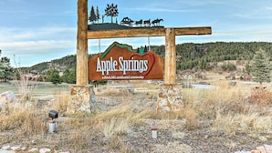 A sign for Apple Springs in Boulder Canyon, a Black Hills residential community.