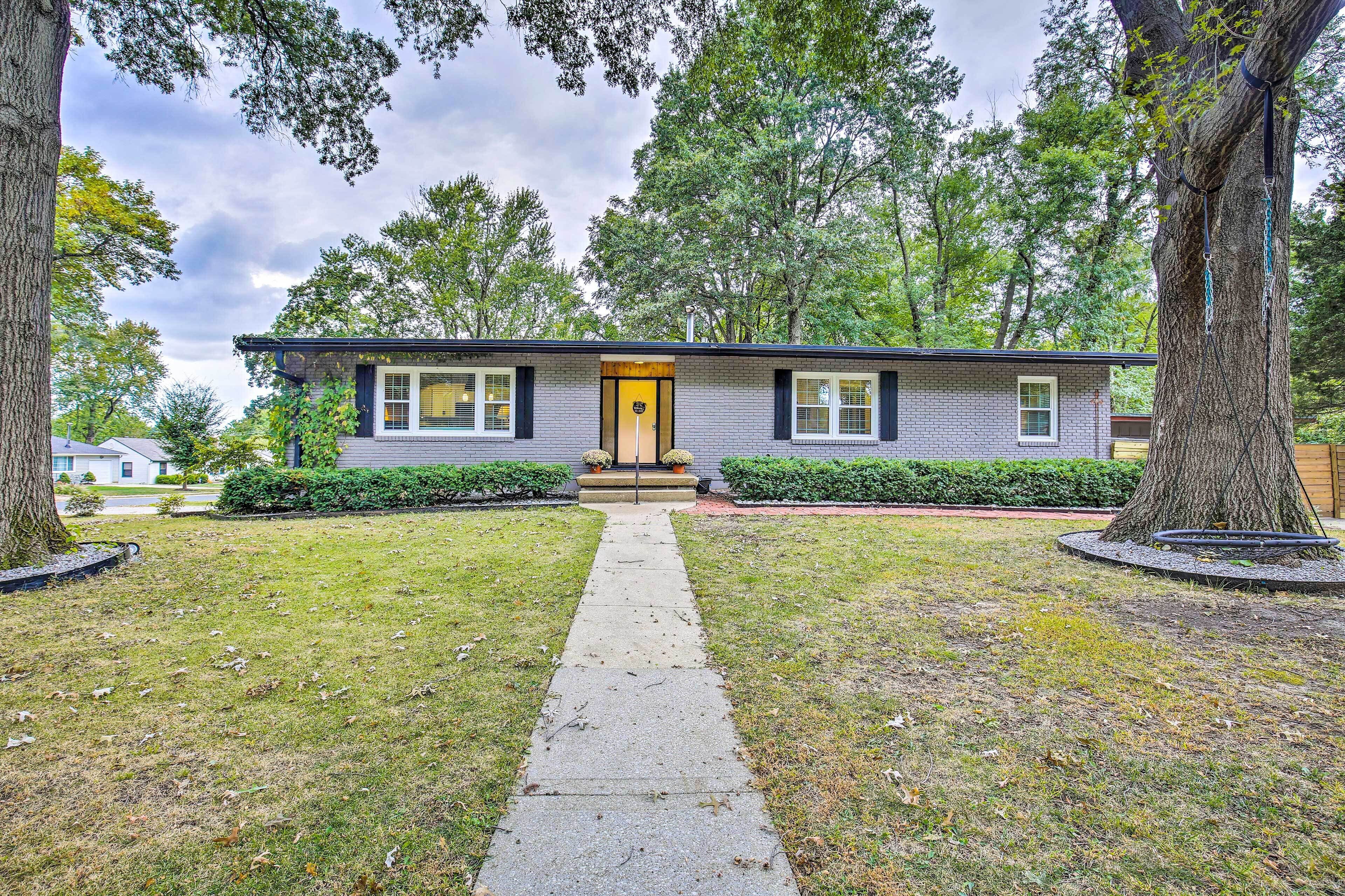 Overland Park Home w/ Deck & Waterfall Pond!
