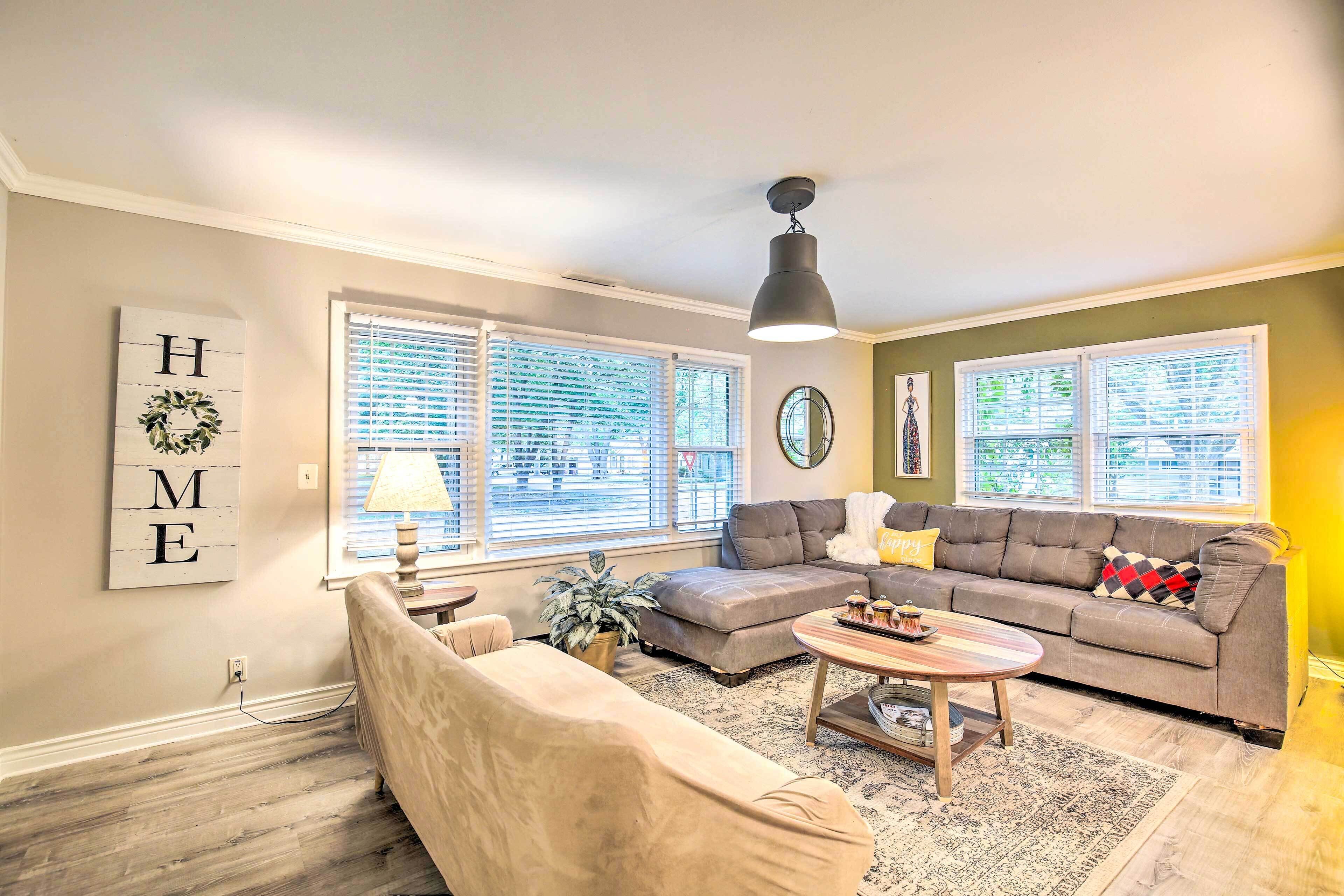 Overland Park Home w/ Deck & Waterfall Pond!