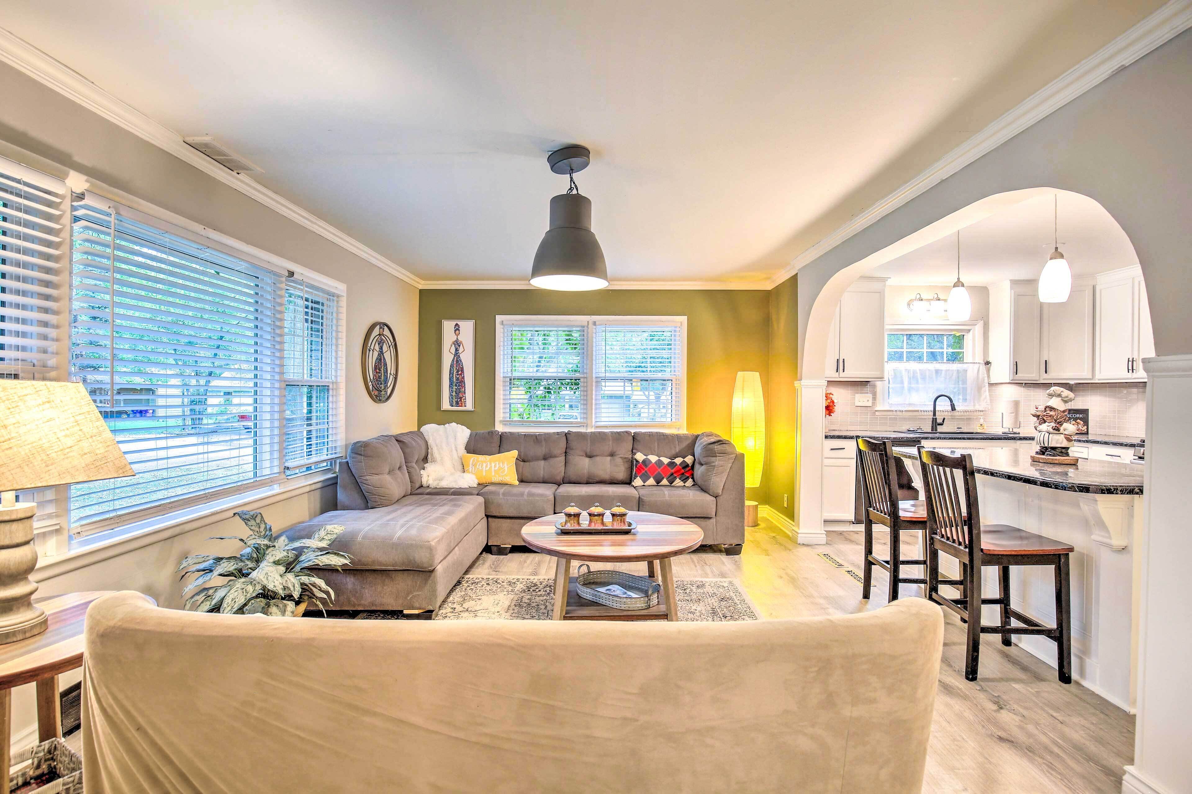 Overland Park Home w/ Deck & Waterfall Pond!