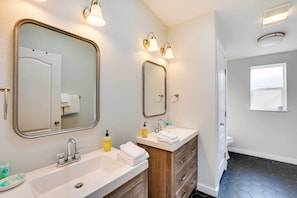A bathroom with two sinks, a mirror, and a window. - Serene Sequim Retreat w/ Deck: Pets Welcome! (Sequim)