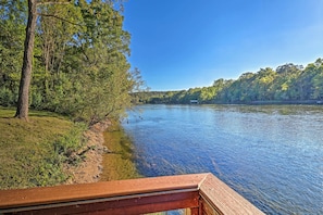 A river with a wooden deck in the foreground. - 'riverside Hide-a-way' w/ Fire Pit, Fishing, BBQ (Mountain Home)