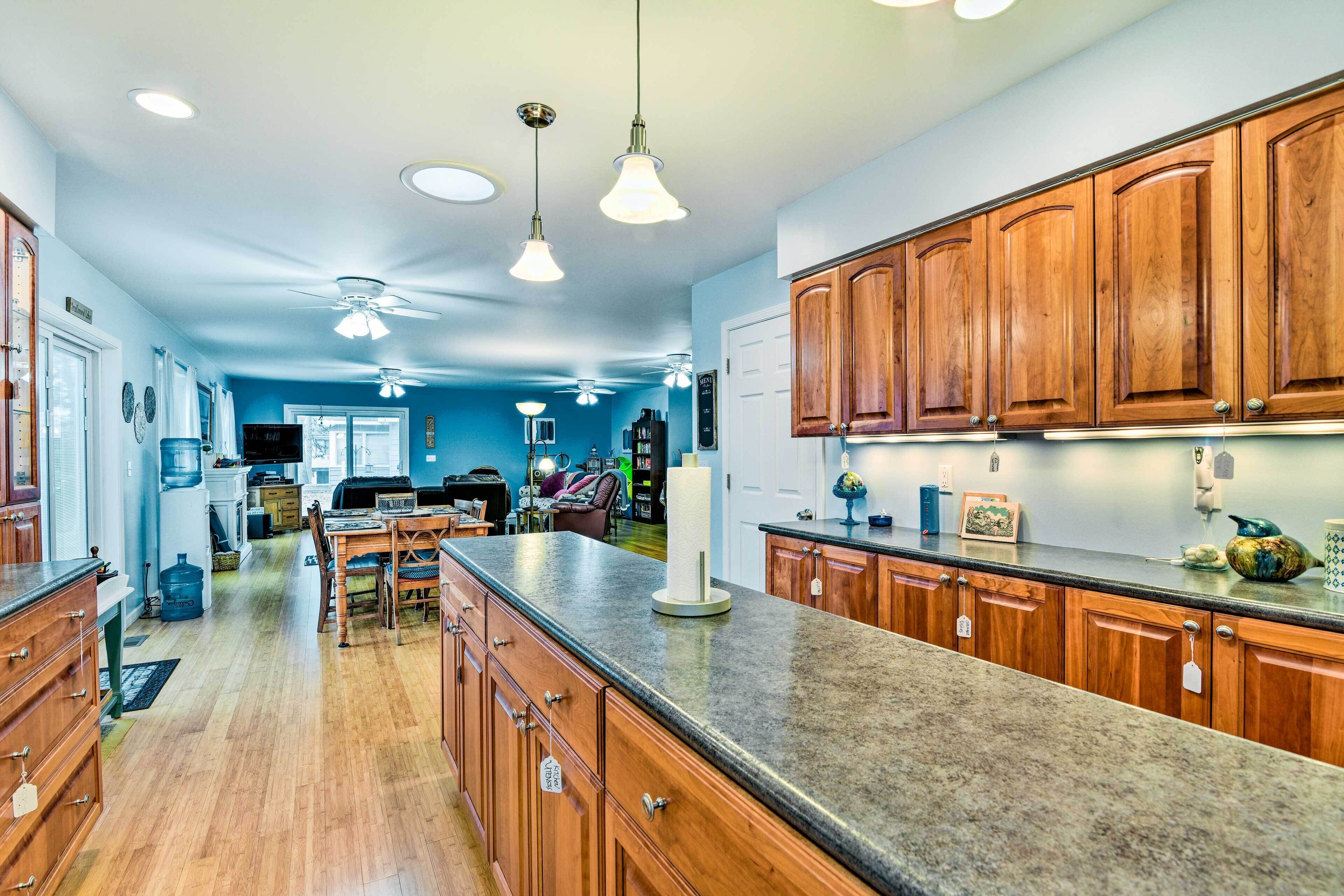 Waterfront Gladwin Home w/ Deck + Fire Pit!