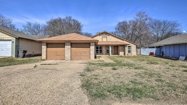 A residential house with a garage, a front yard, and a backyard. - West San Antonio Home w/ Yard: 16 Mi to Dtwn! (San Antonio)