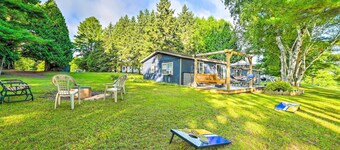 Riverfront Home w/ Dock ~ 6 Mi to Cheboygan!