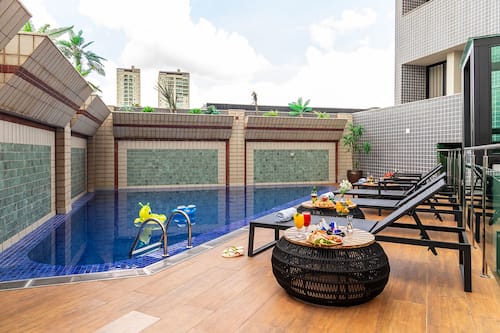 Outdoor pool, open 10:00 AM to 10:00 PM, pool umbrellas, sun loungers