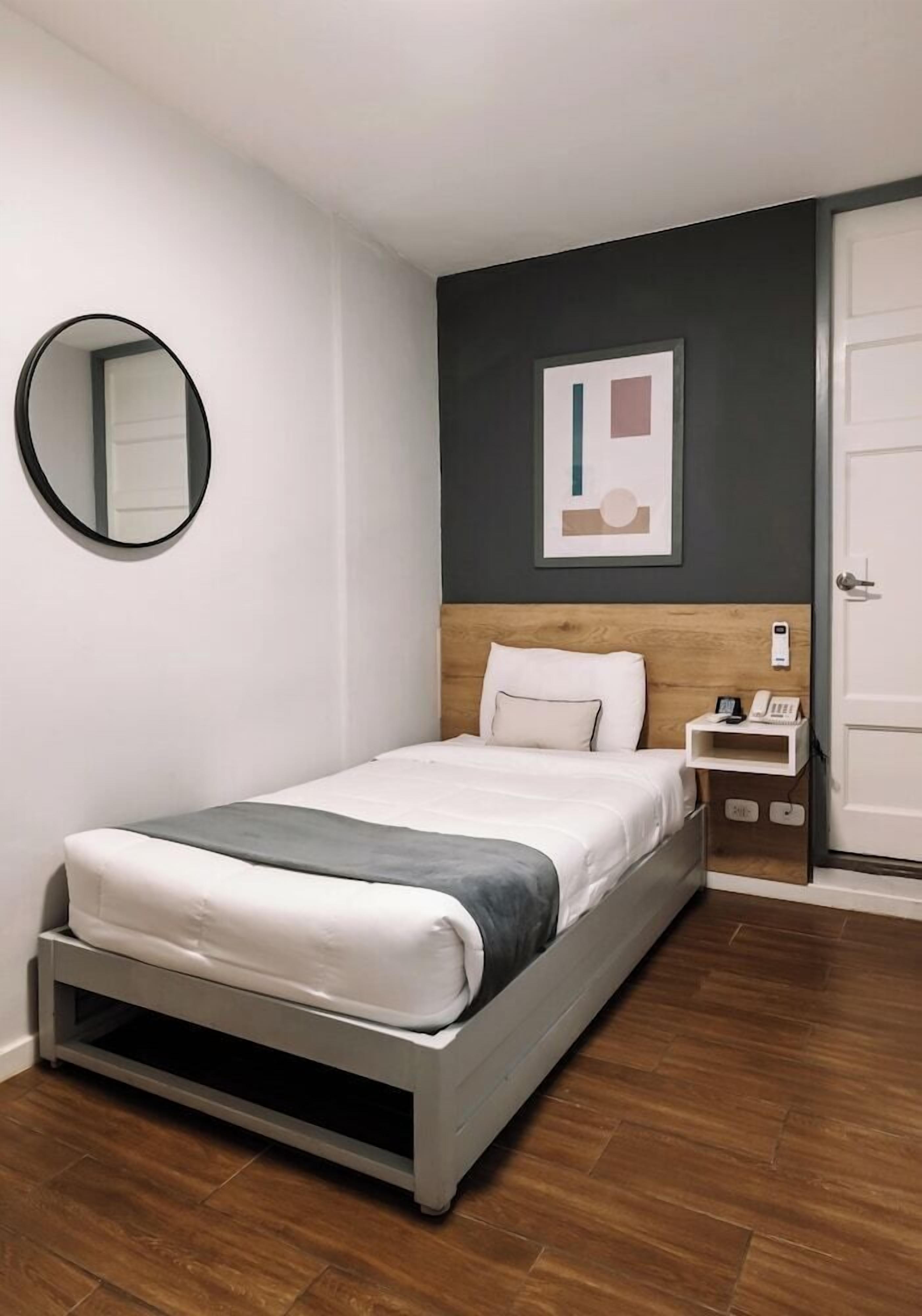 Down duvets, Select Comfort beds, in-room safe, desk