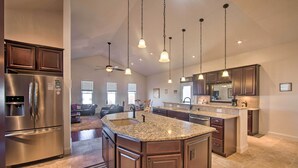 A modern kitchen with granite countertops, stainless steel appliances, and pendant lighting. - Gettysburg Area Retreat, 12 Mi to Nat'l Park! (New Oxford)