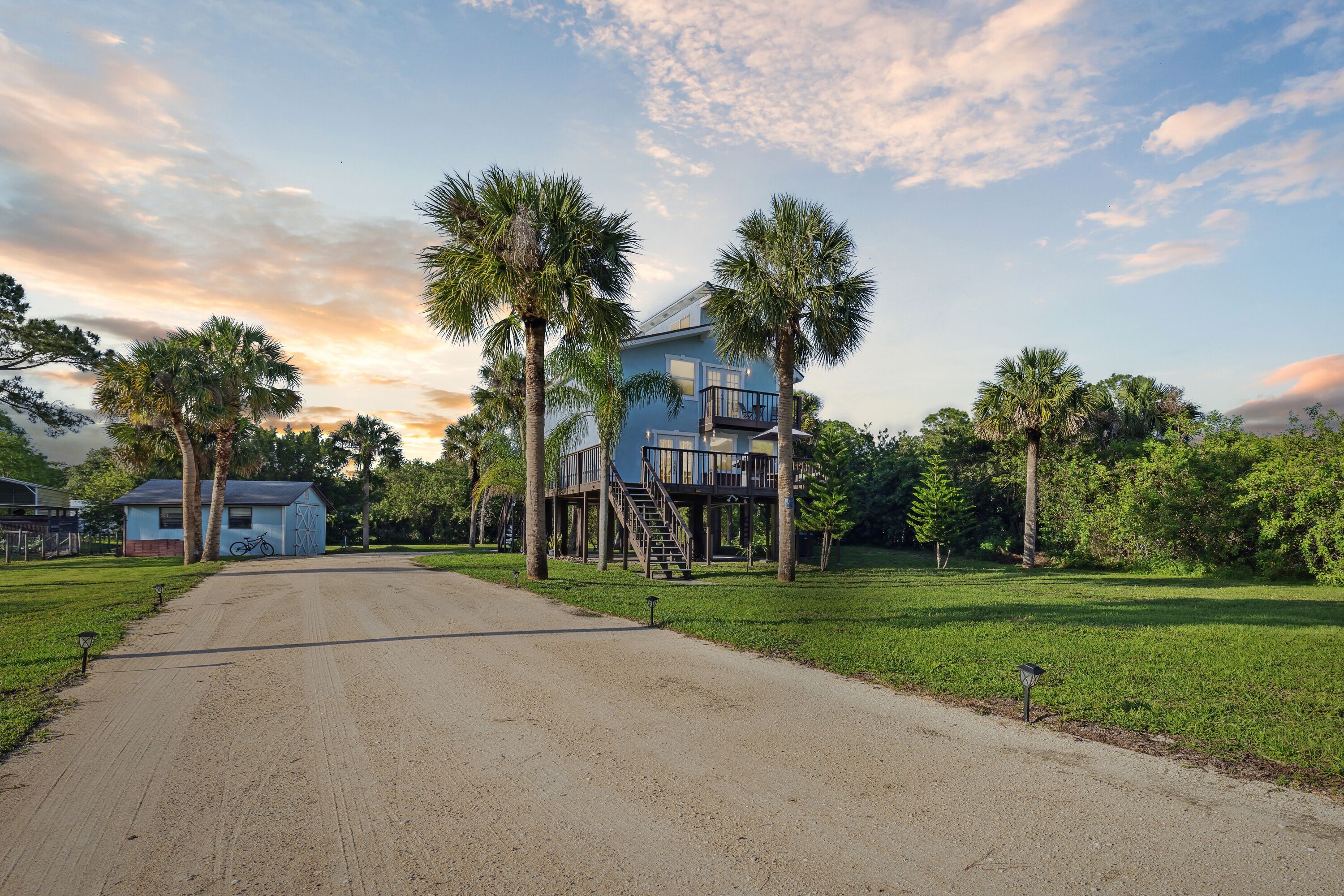 Luxury Stilt Beach House in the Woods! 3/2.5 w/ Stocked Pond & Oasis on 1 ACRE!
