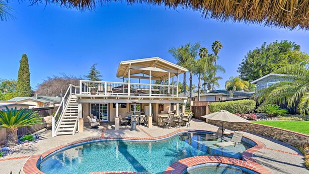 A two-story house with a pool, outdoor furniture, and a covered patio area. - Vista Home w/ Pool ~ 11 Mi to Tamarack State Beach (Vista)
