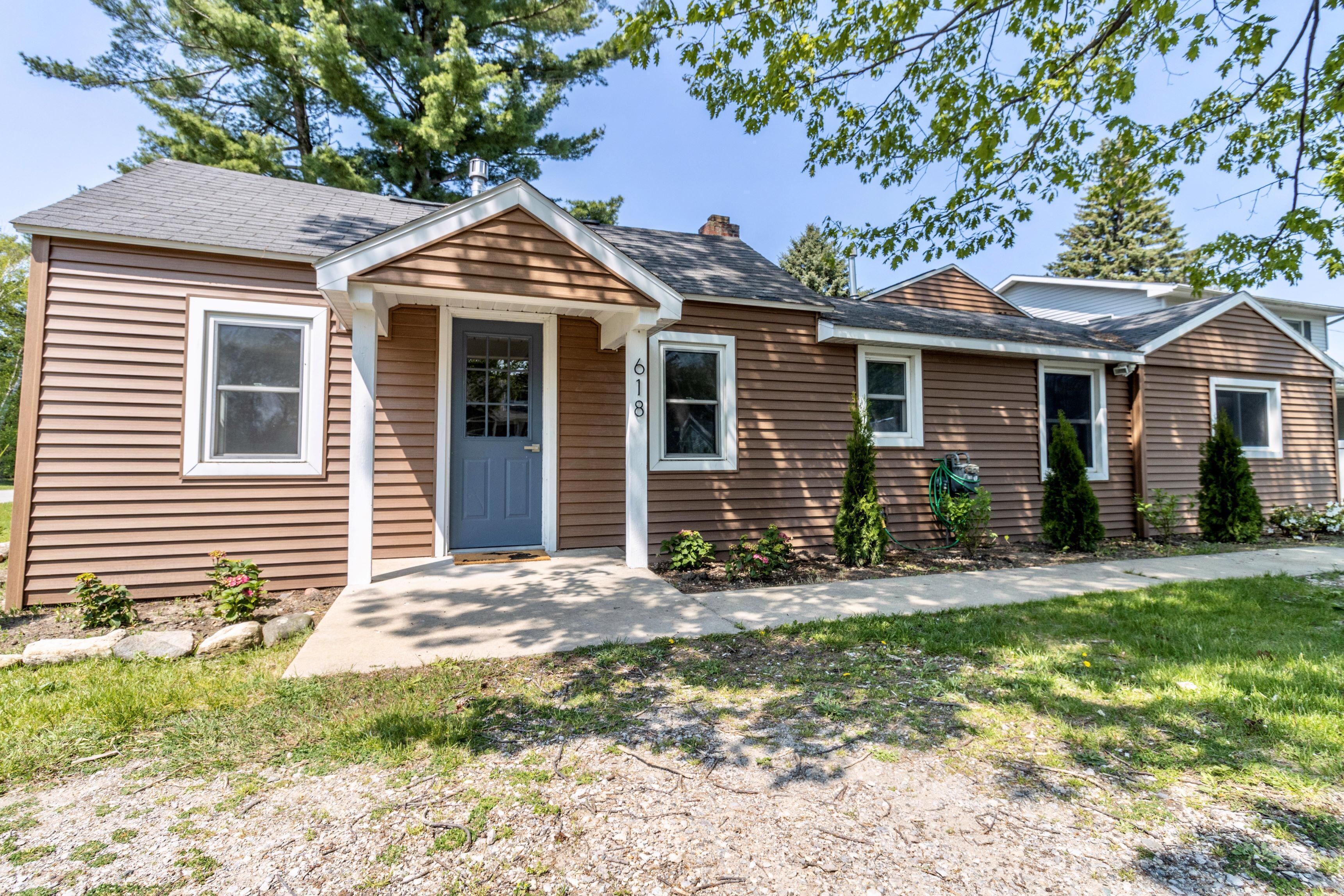 3 bedroom 2 bath home in Elk Rapids with parking for boat trailer