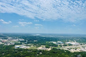 A panoramic view of a town with buildings, roads, and greenery. - Luxe Home 30 Miles to Houston w/ Pool & Grill (Cypress)