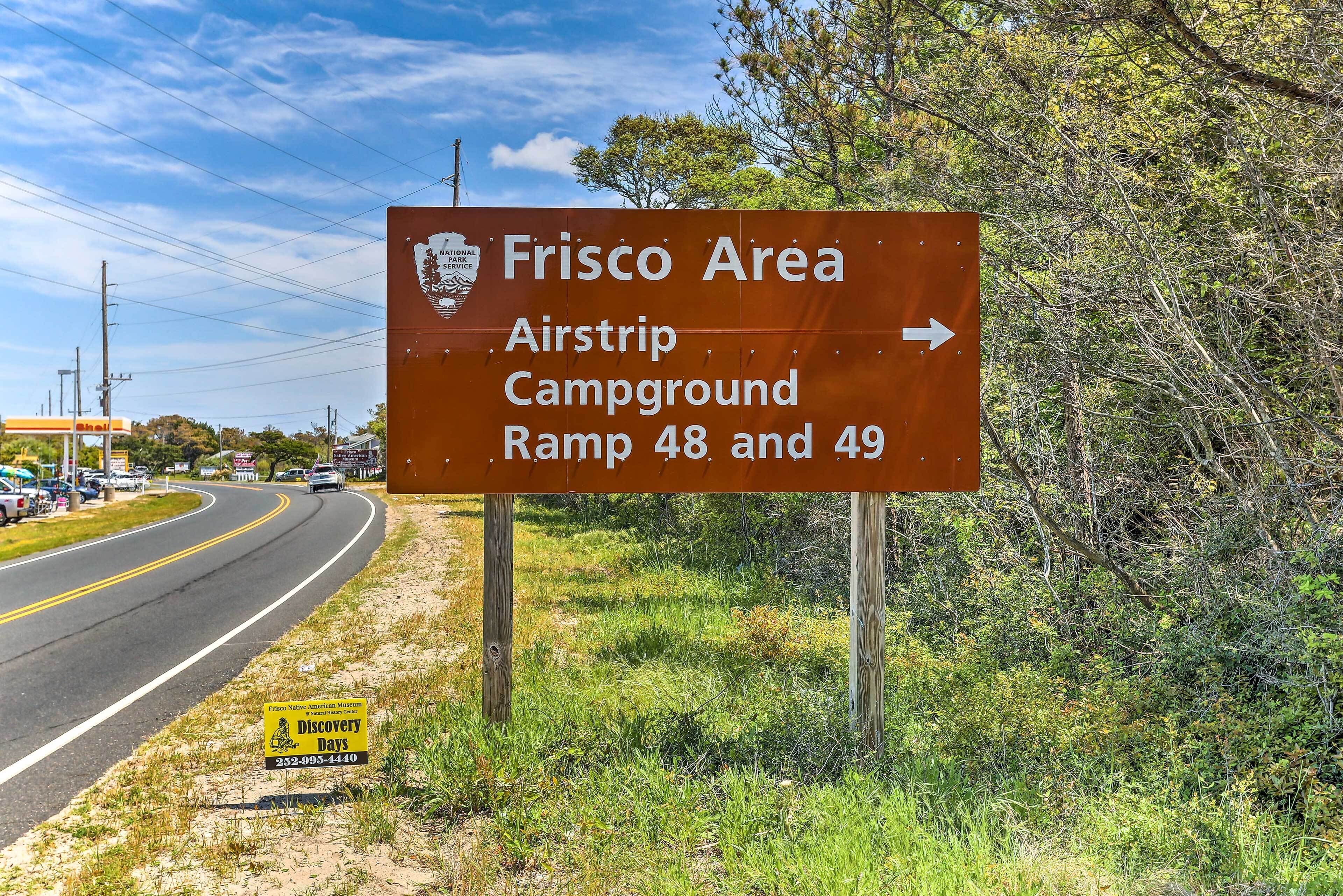A directional sign for the Frisco Area Airstrip Campground and Ramps 48 and 49.