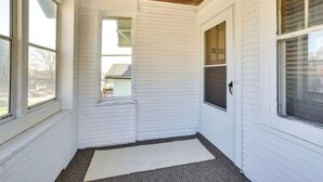 A room with white exterior walls, a wooden ceiling, and a small window. - Quaint Omaha Home < 5 Mi to Downtown! (Omaha)