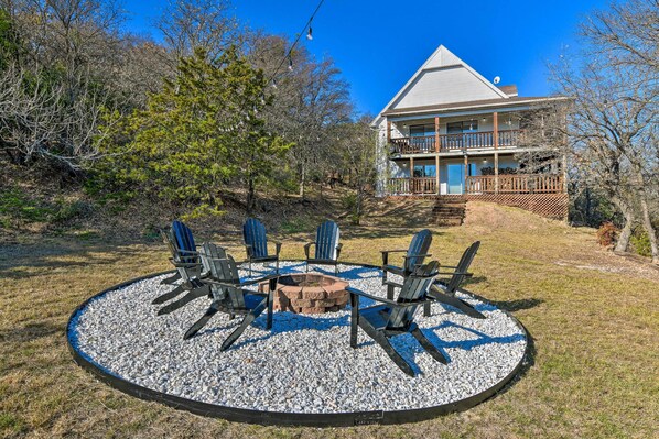Enjoy the view from the upper balcony or relax in the cozy seating area with a fire pit.