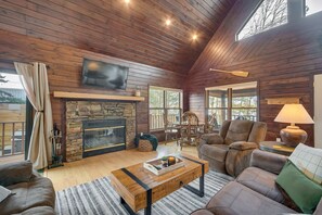 TV, fireplace, video game console, books - Wisconsin Cabin w/ Private Hot Tub & Deck (Turtle Lake)