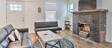 House (3 Bedrooms) | Living area | TV, fireplace