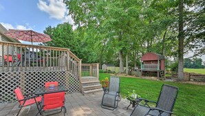 A patio with outdoor furniture, a wooden deck, and a small shed. - Peaceful Country Retreat w/ Easy Highway Access! (Browns Summit)