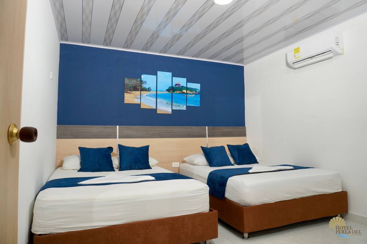 Habitación cuádruple estándar | Wifi gratis y ropa de cama