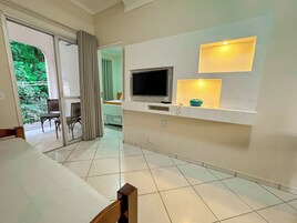 Superior Room | Living area | 32-inch Smart TV with cable channels